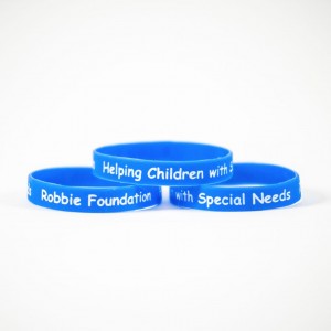 Blue wristbands with Robbie Foundation printed in white